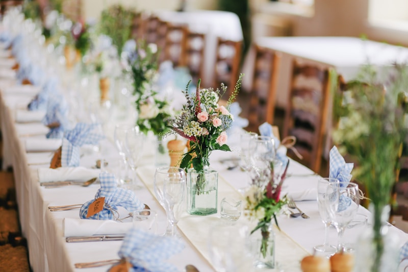 Wedding reception dinner table with floral centerpieces